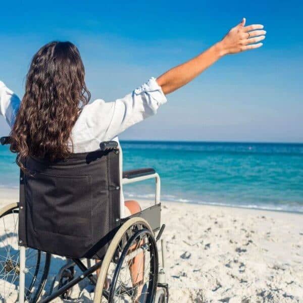 woman_in_wheelchair_near_sea.jpeg