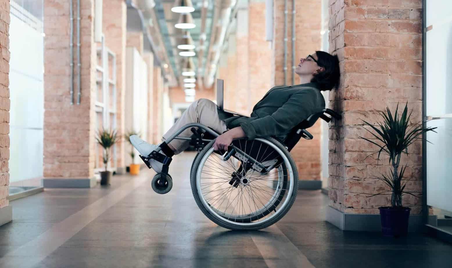 woman leaning back in wheelchair