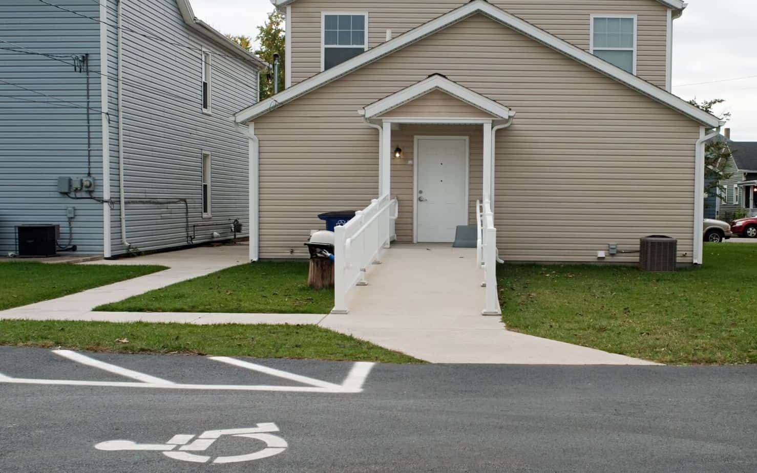 gray apartment with wheelchair ramp for handicap people