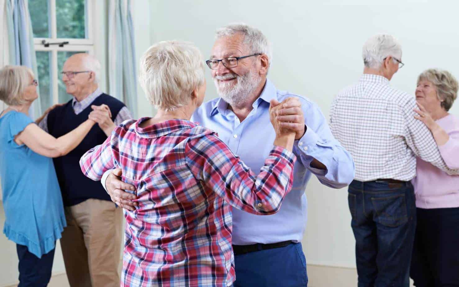 group of seniors dancing while on a speed dating event