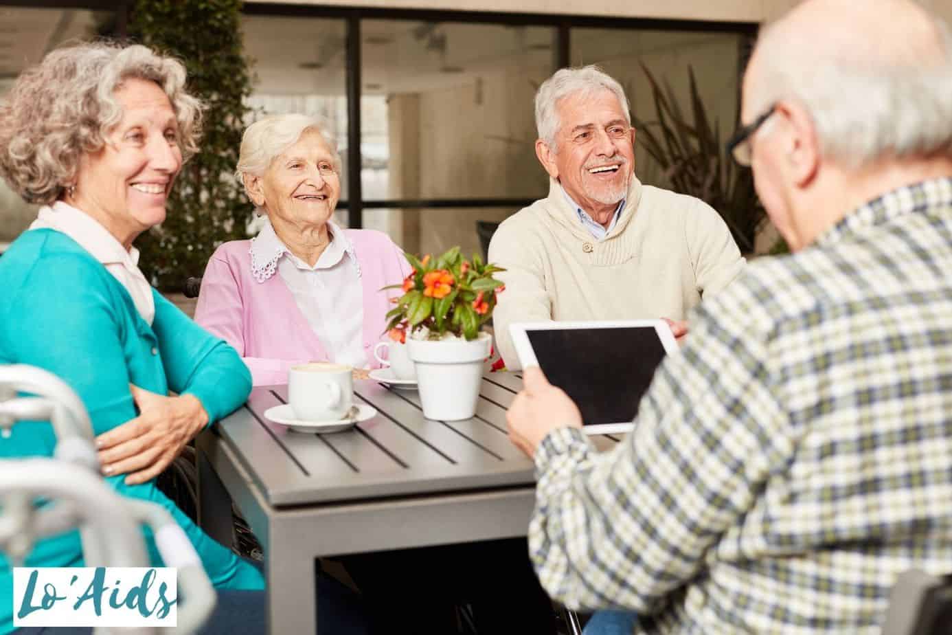 senior citizens having a bonding moment with their tablet