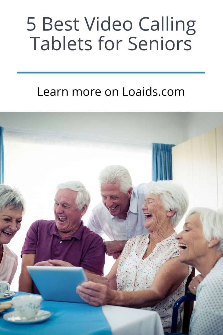 group of senior citizens using a tablet for video calling