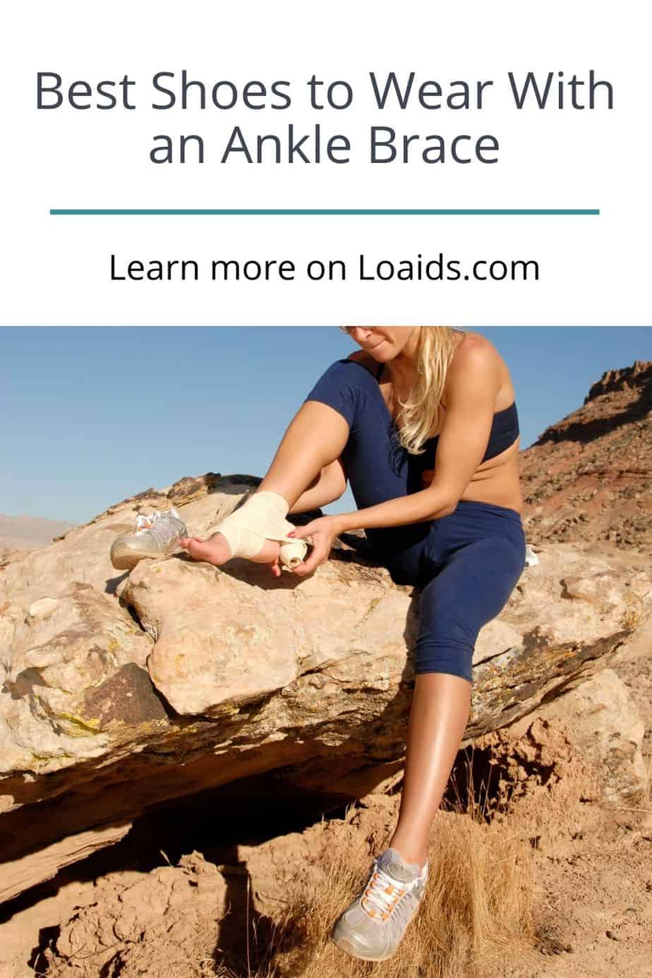 lady putting on ankle braces while sitting on a rock