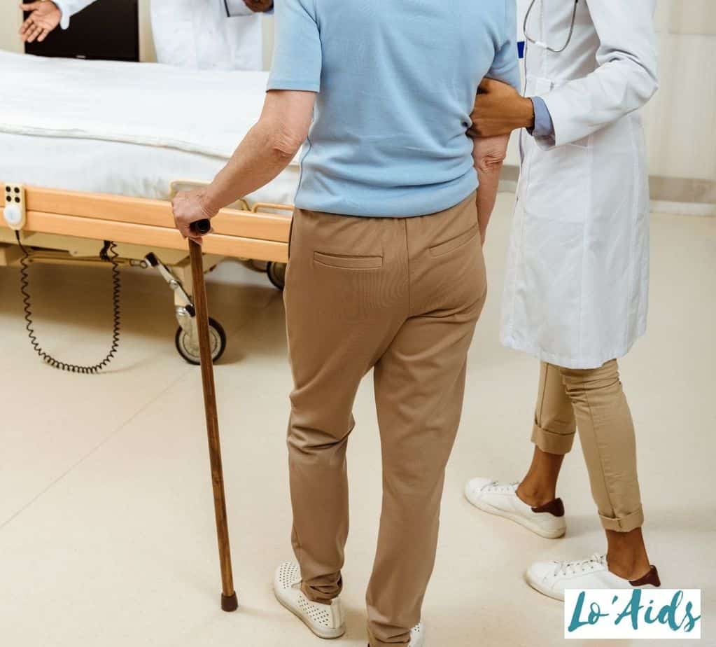 patient holding using a walking cane