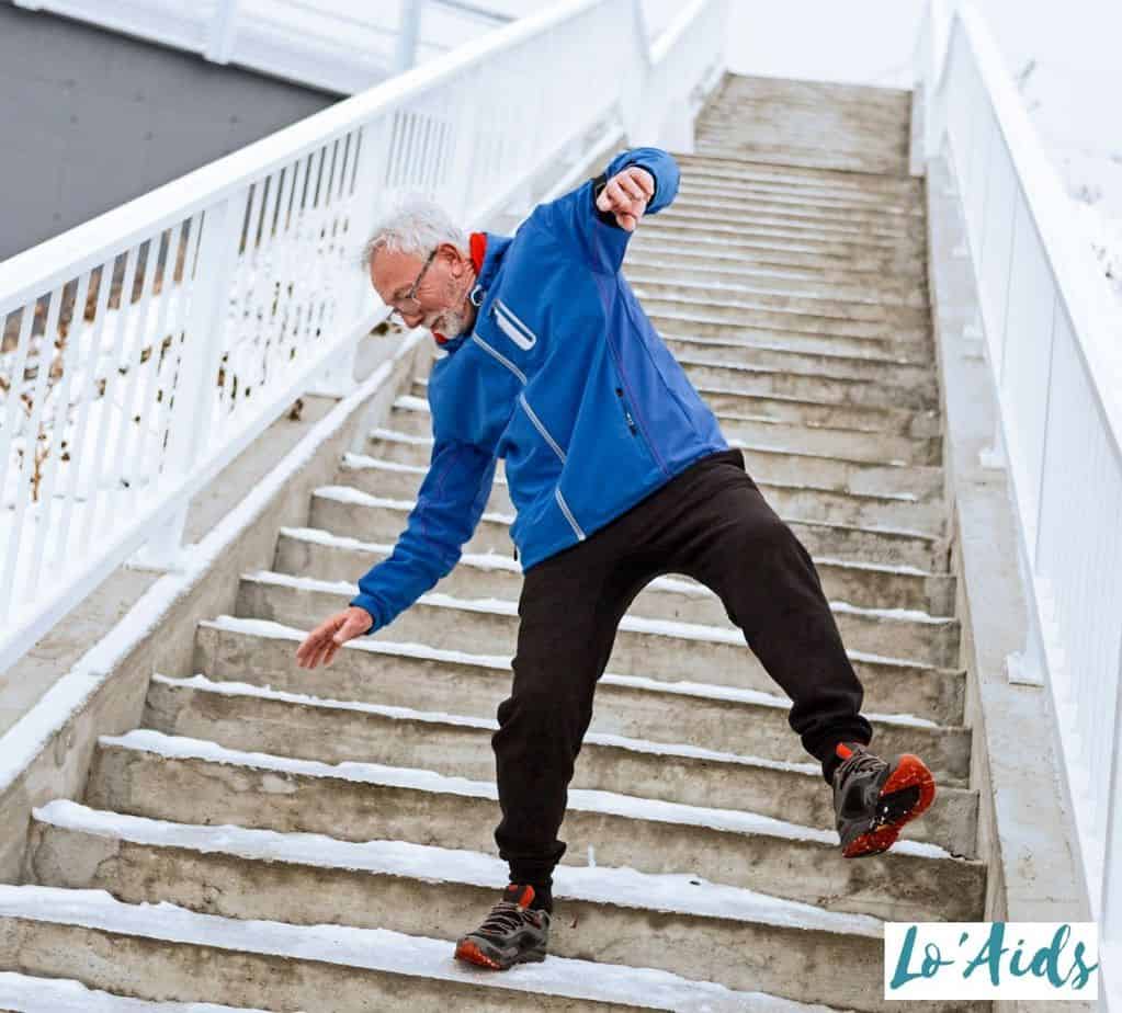 senior losing his balance on the staircase