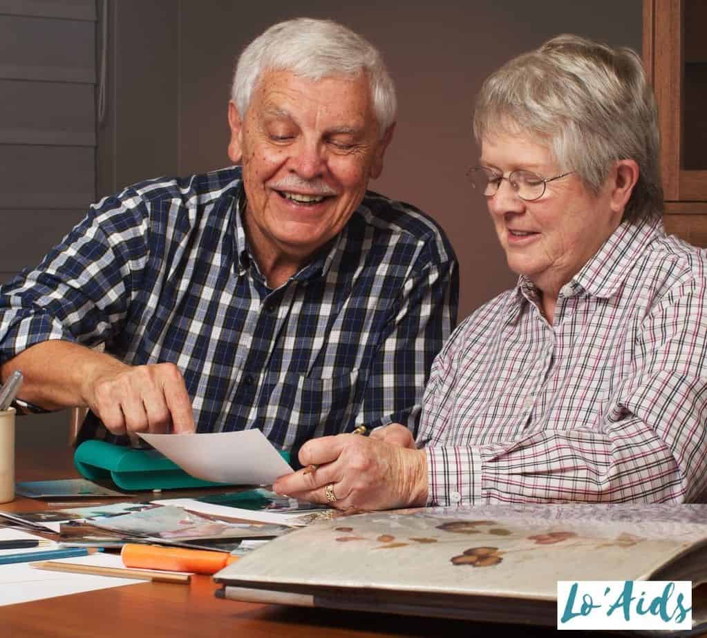 seniors making scrapbook in a home organization where to donate electric wheelchairs