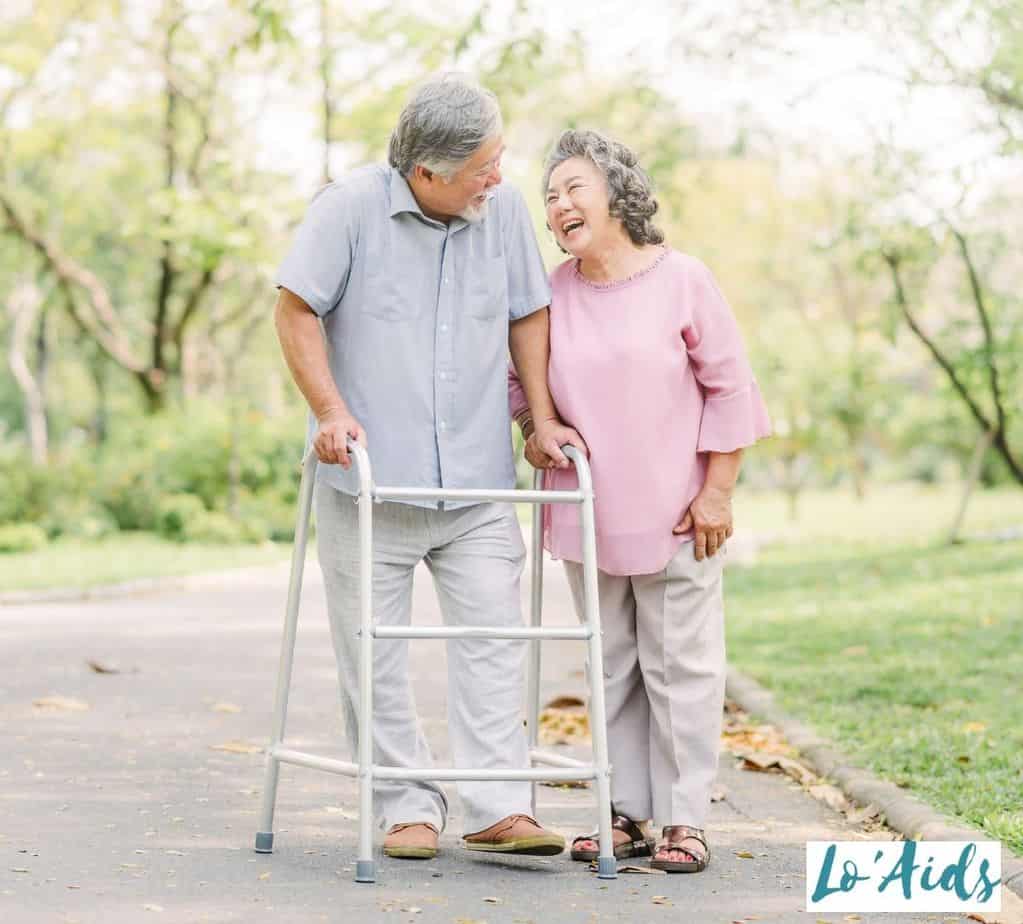 elderly couple walking with nature