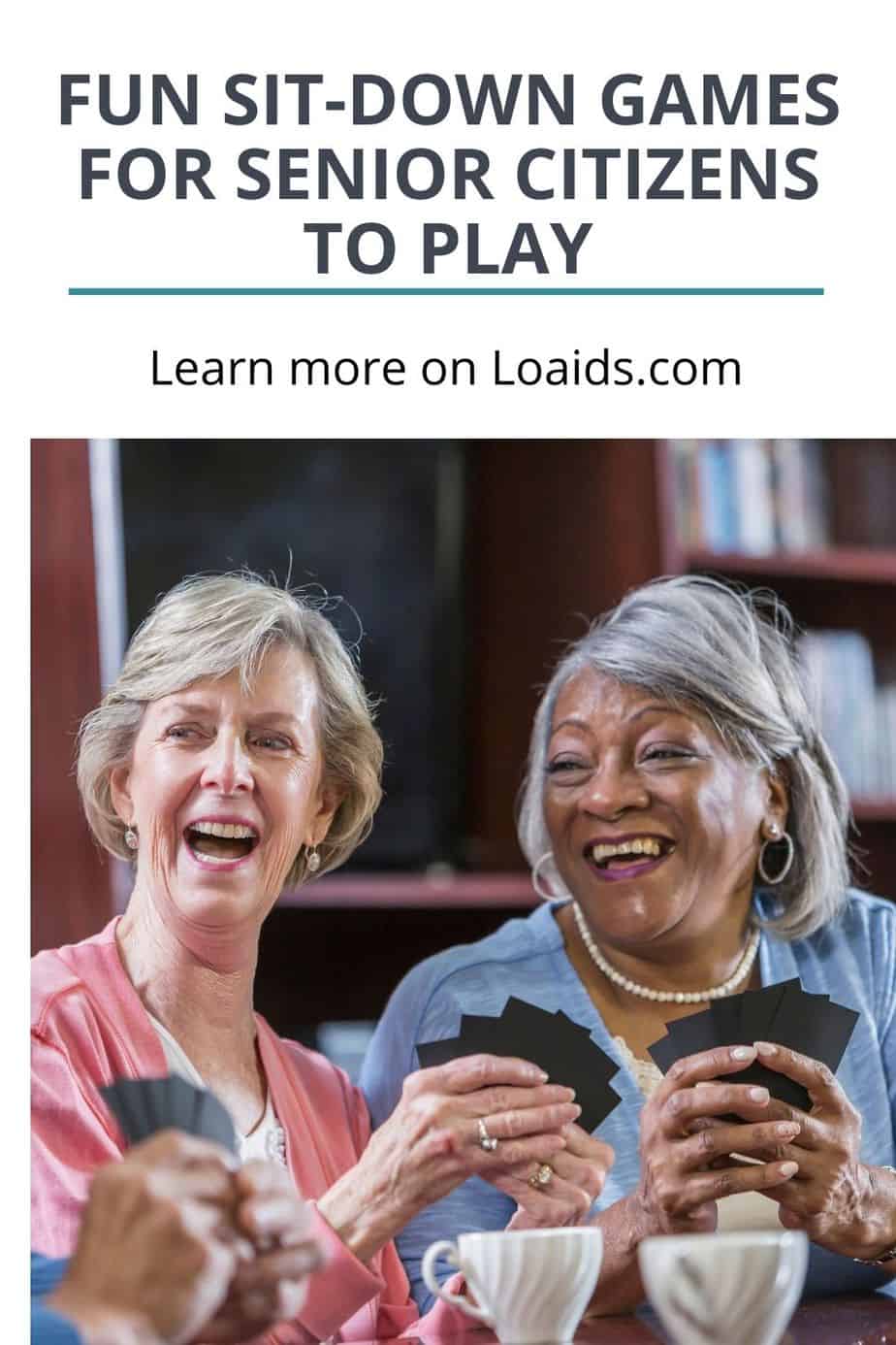 2 senior ladies laughing while playing card games under title sit-down games for senior citizens