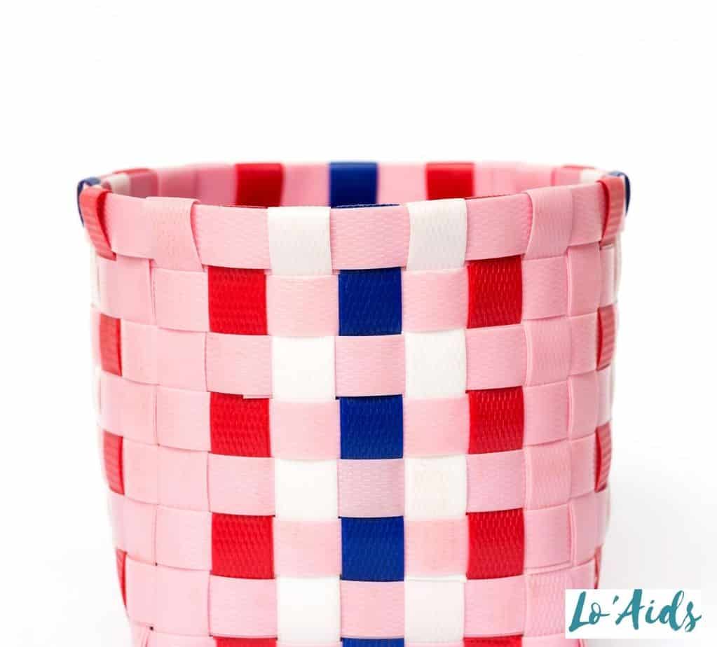 pink, red and blue weaved paper basket under title CRAFTS FOR PARKINSON'S PATIENTS TO TRY