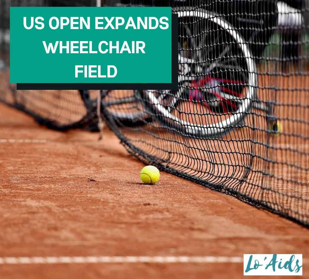 a wheelchair in a tennis court next to a tennis ball