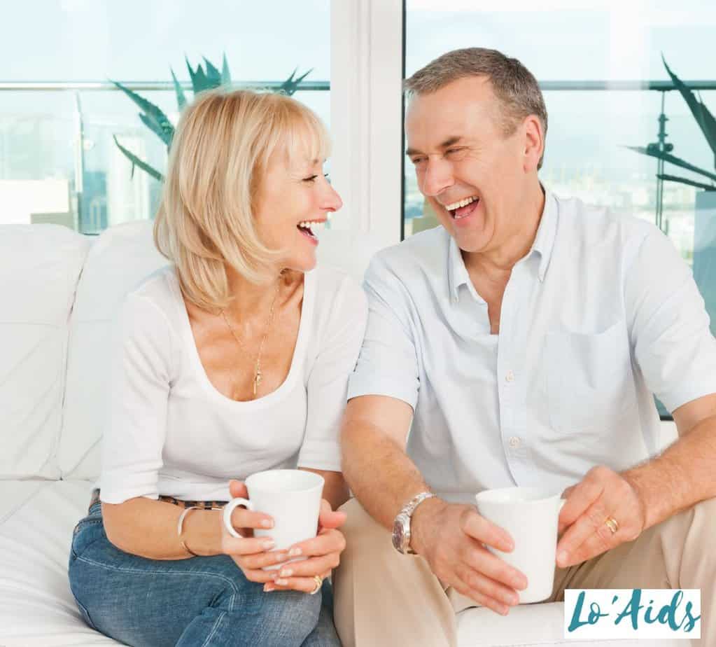 WOMAN AND MAN HAVING A FUN COFFEE TIME