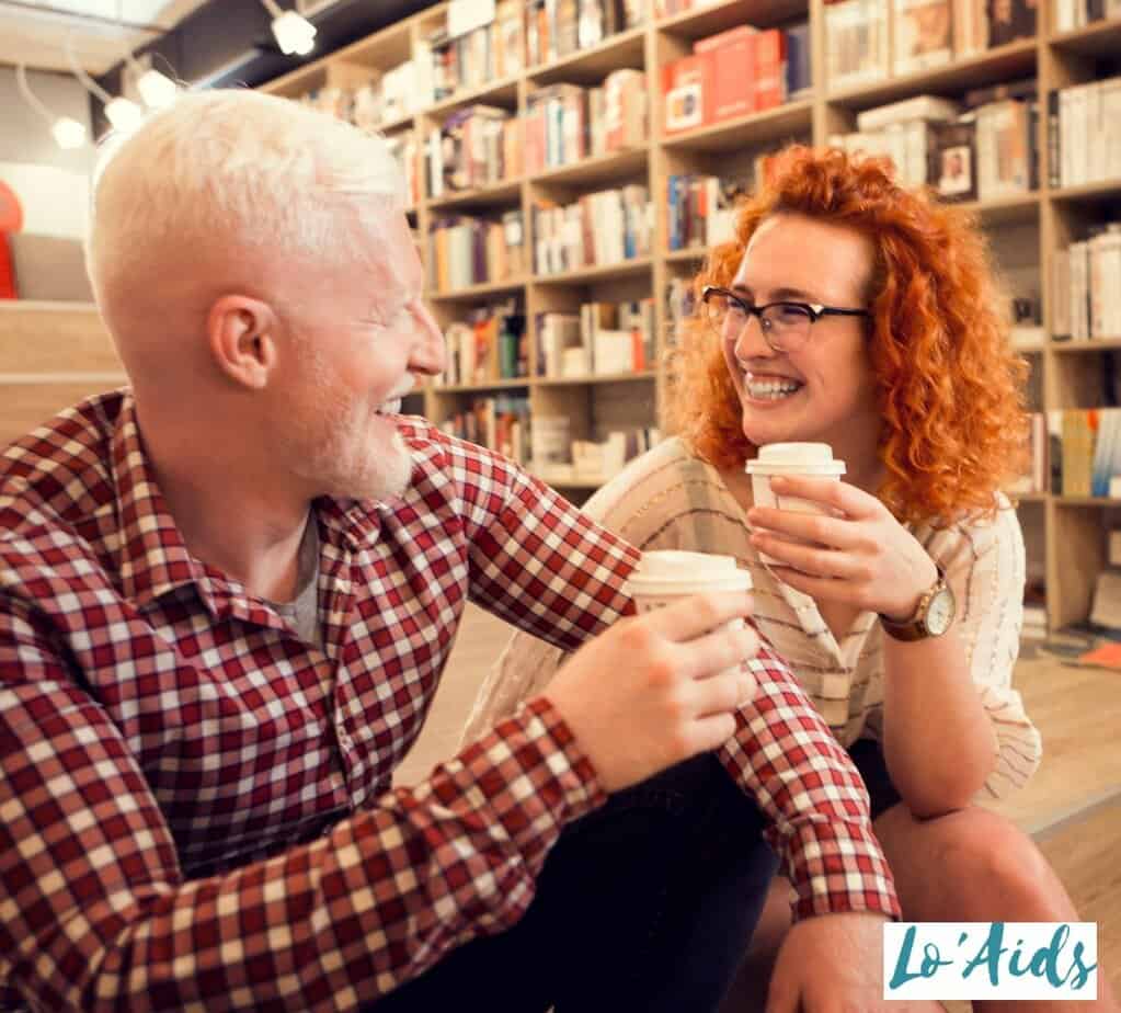 lady and older man drinking coffee at the bookstore