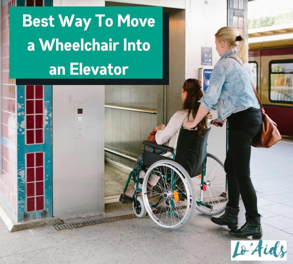 an assistant trying a best way to move a wheelchair into an elevator