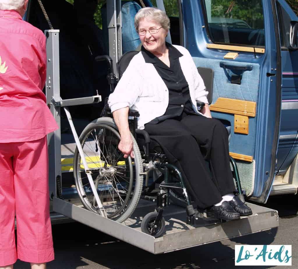 wheelchair women getting out from van