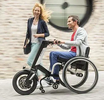 Wheelchair front wheel power